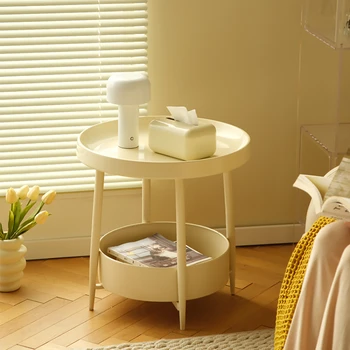Современный минималистичный край дивана в кремовом стиле с вместимостью для хранения, округлая индивидуальность, маленький круглый столик, прикроватная тумбочка в спальне
